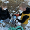Researchers Julie Korak and Cresten Mansfeldt collect surface water samples on the Coal Creek waterway.