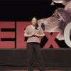 Orit Peleg speaks on the TedXCU stage
