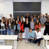 Students stand in a classroom in Lecco, Italy during a previous Global Intensive