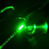Pipette tip prototype illuminated by green light