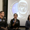 CU Boulder aerospace engineers Torin Clark, left, and Allie Hayman, right, sit with the crew of Polaris Dawn during an event on campus in 2022.