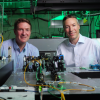 Quantum Engineering Initiative lead Greg Rieker, right, with Scott Diddams in the lab.