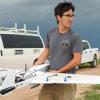 Student getting ready to deploy a drone