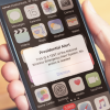 A phone showing the test presidential alert sent in 2018