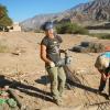Zoey Craun uses a metal cutting saw on a Bridges to Prosperity job site in Bolivia. 