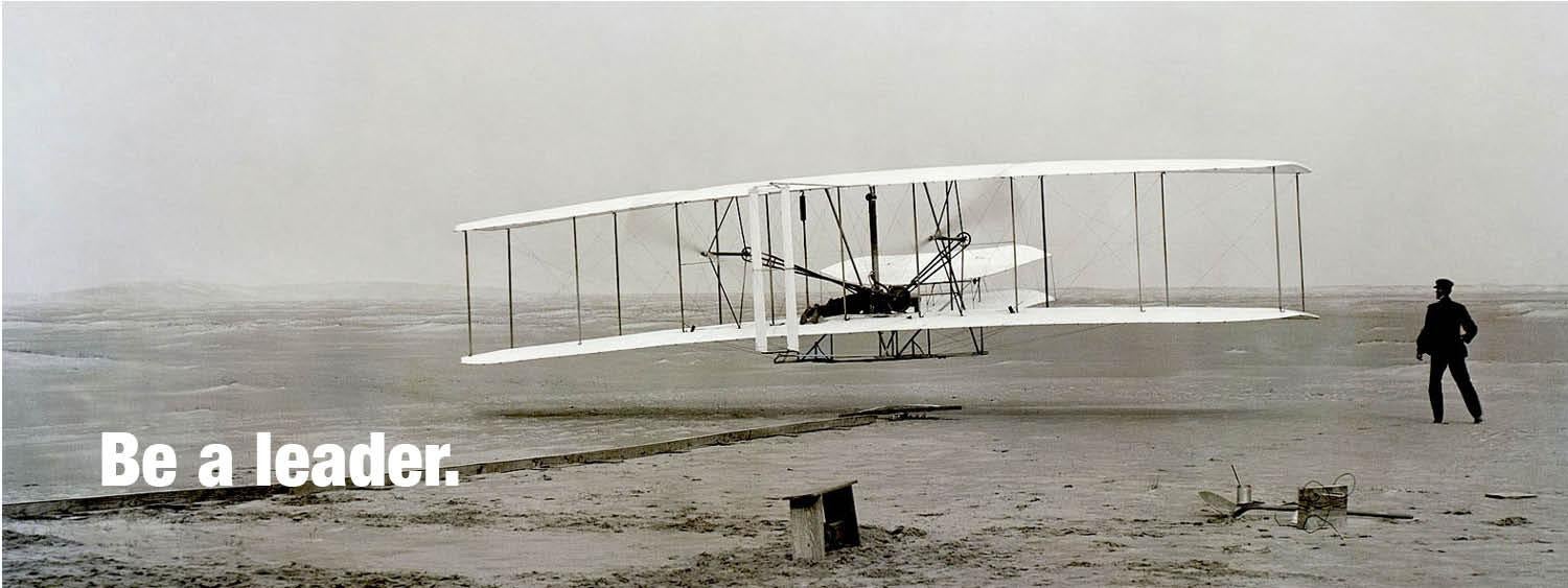 image of vintage airplane and Be a leader text.