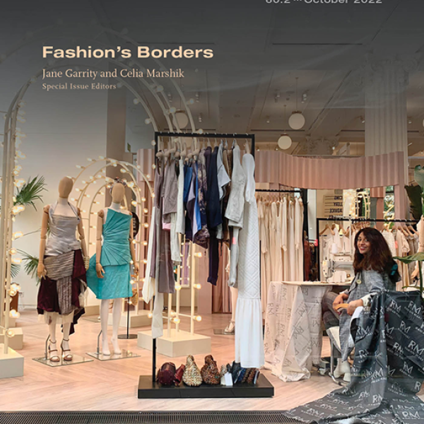 photo of woman and two mannequins in clothing atelier