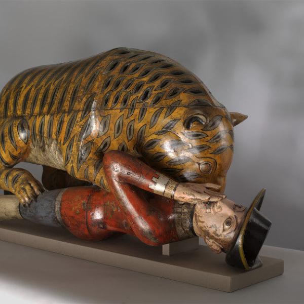Tiger eating a man sculpture
