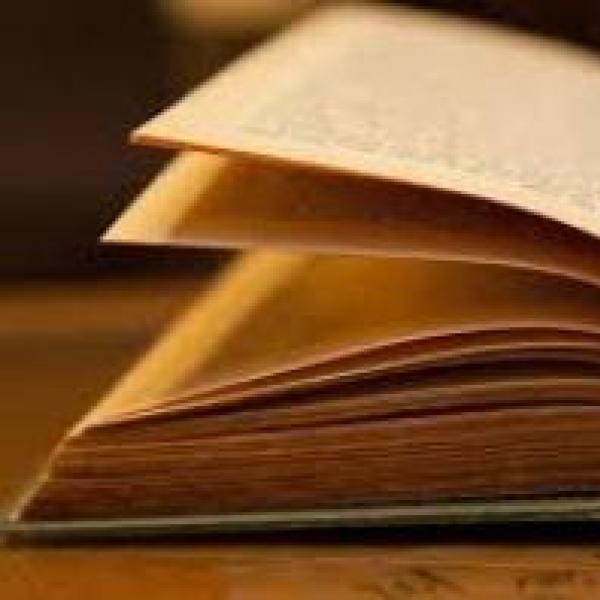 An open book lying on a table