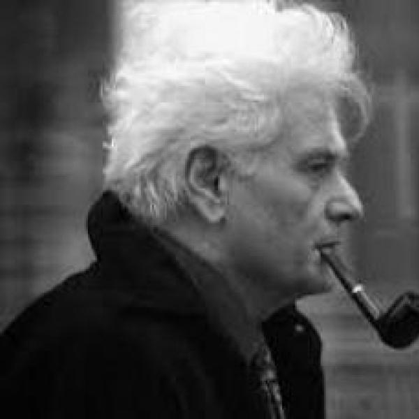 A man smoking a tobacco pipe