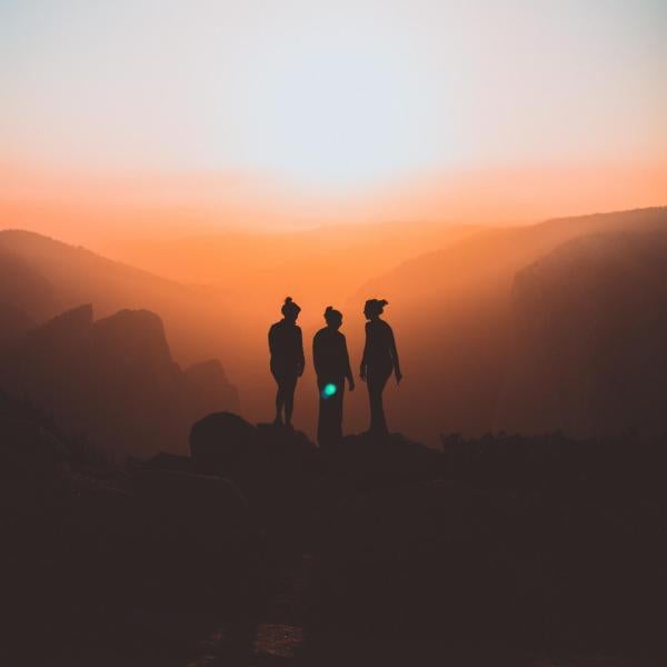 women silhouette in sunset