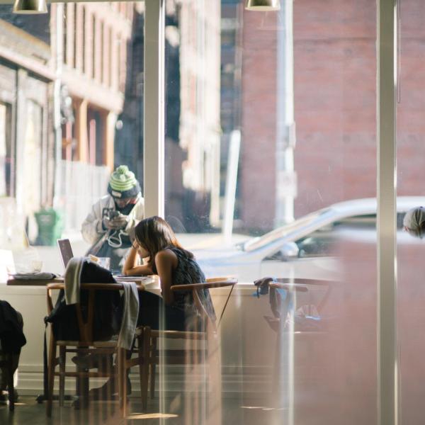 PEOPLE ON PHONE AND LAPTOP