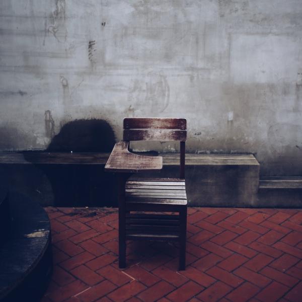 A desk in an empty room
