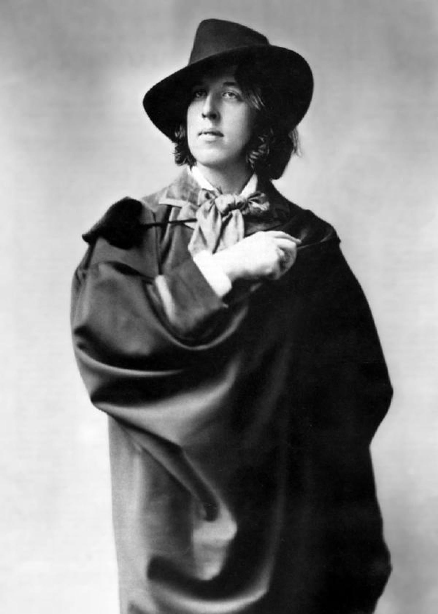 A man in a fancy brimmed hat