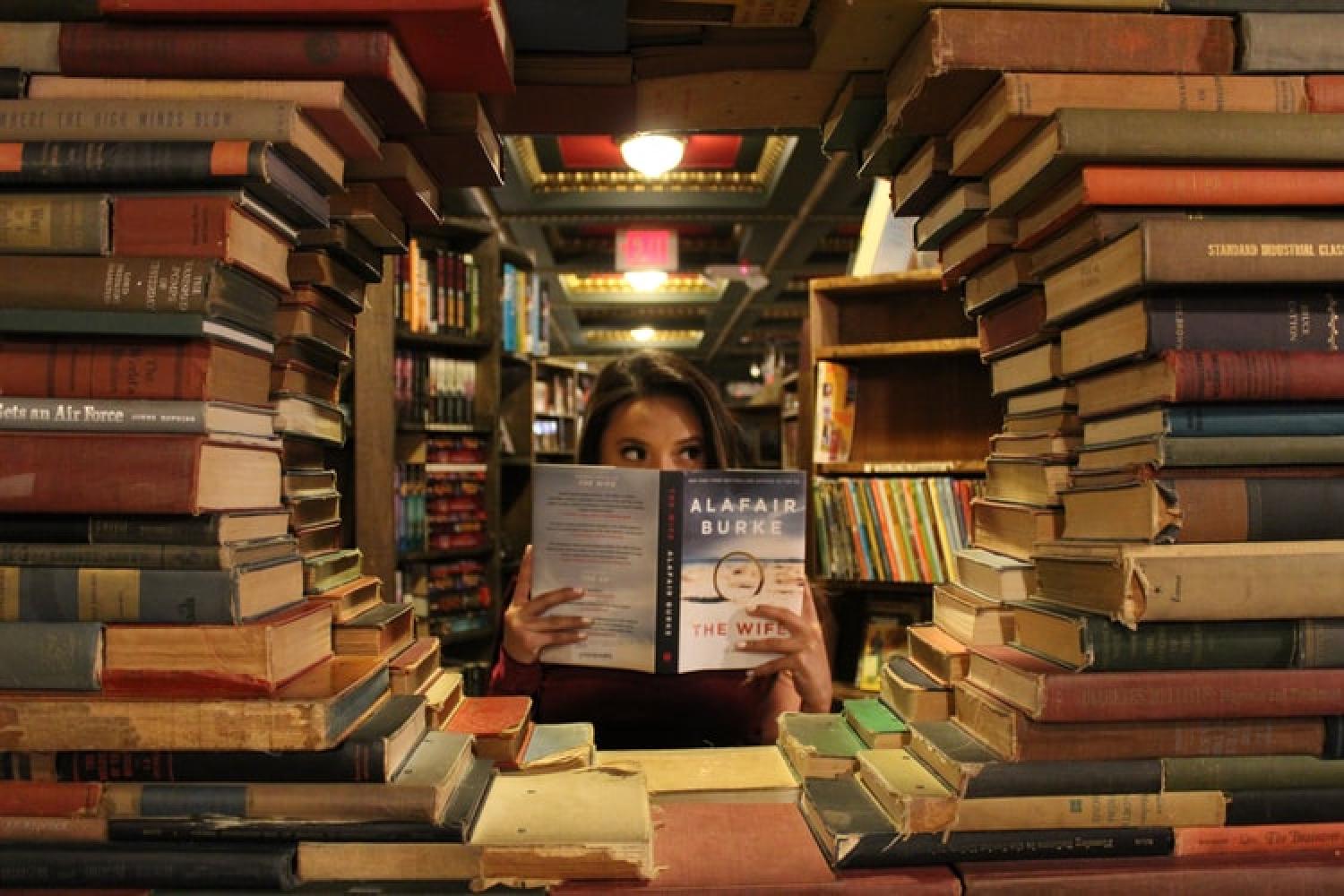 Woman surrounded by books