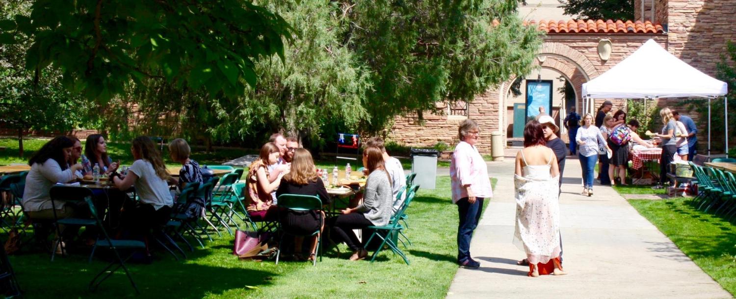 People enjoying the BBQ.