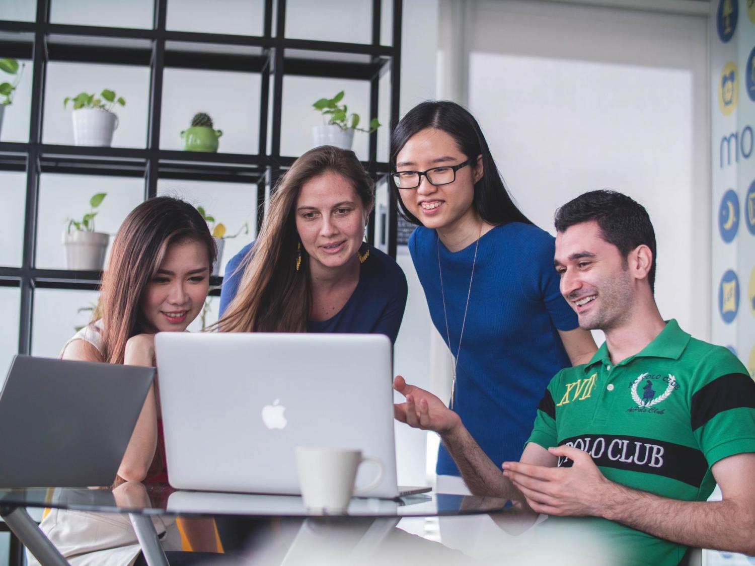 group meeting around a computer