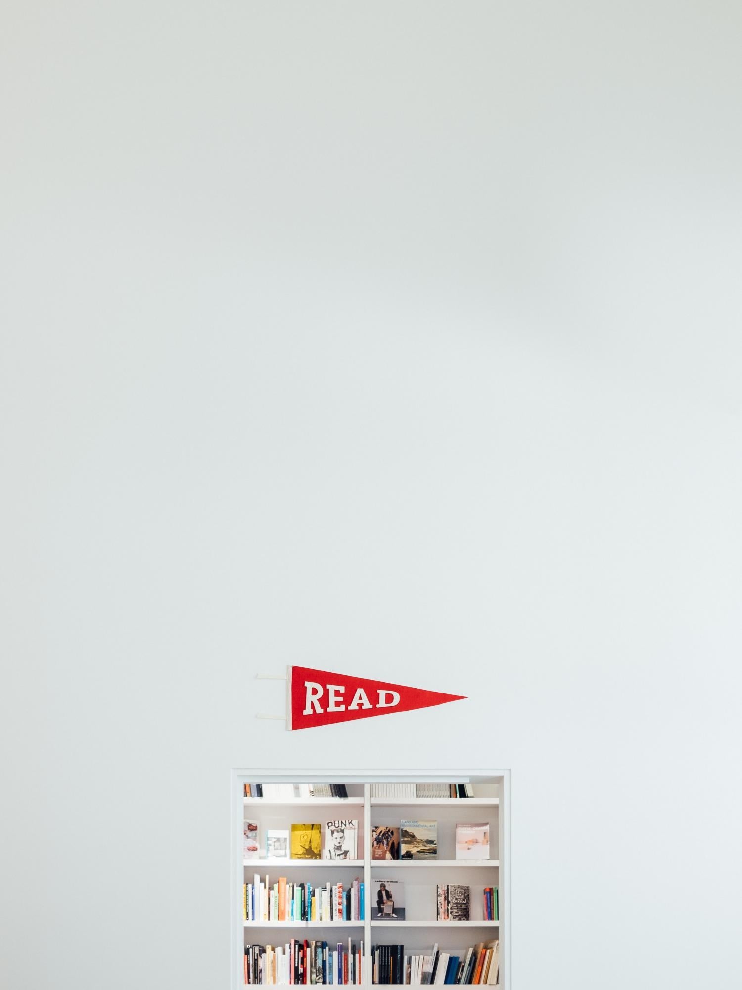 red banner above a bookshelf