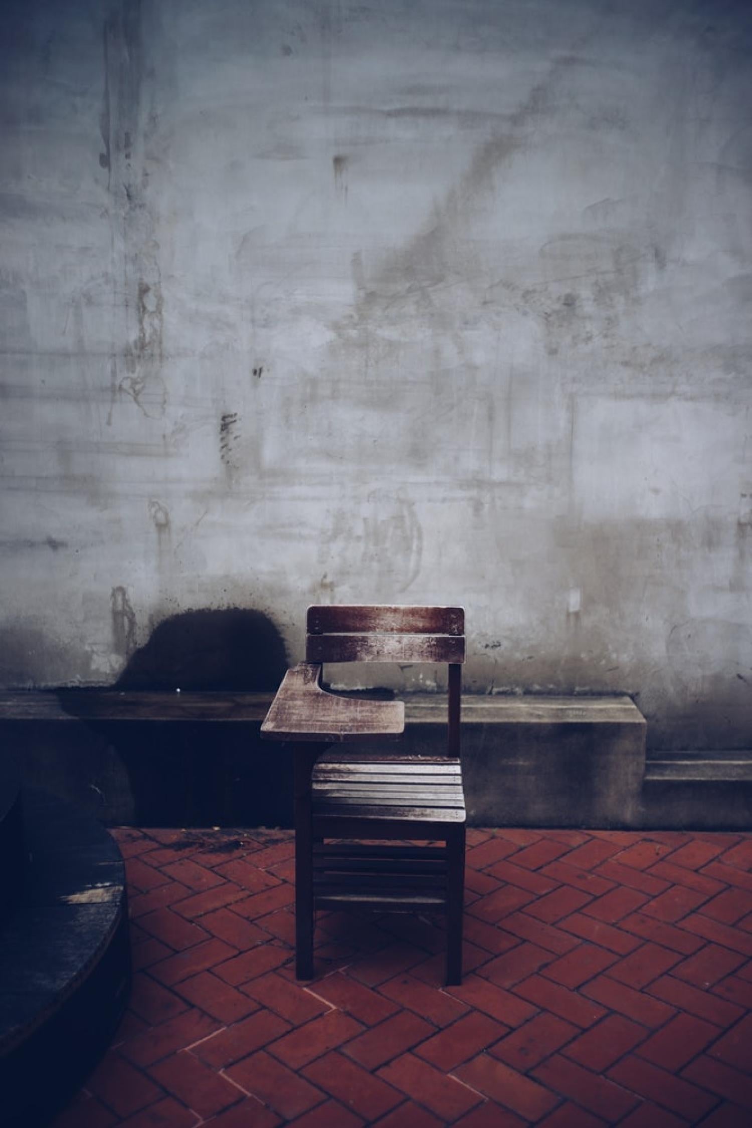 A desk in an empty room