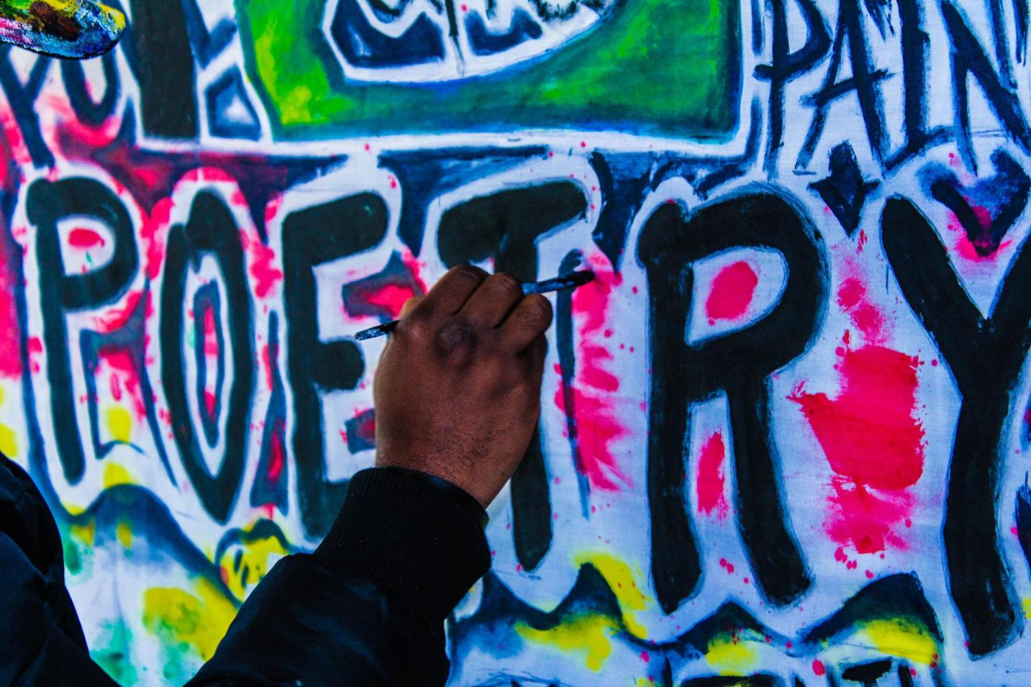 The word poetry written in graffiti