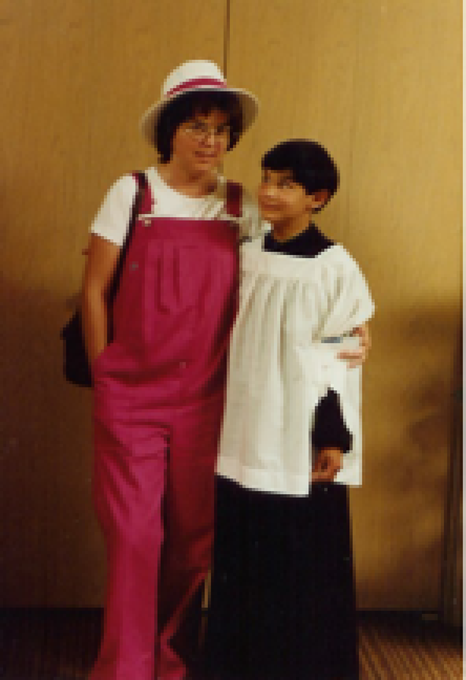 Curt as an altar server, with his mom
