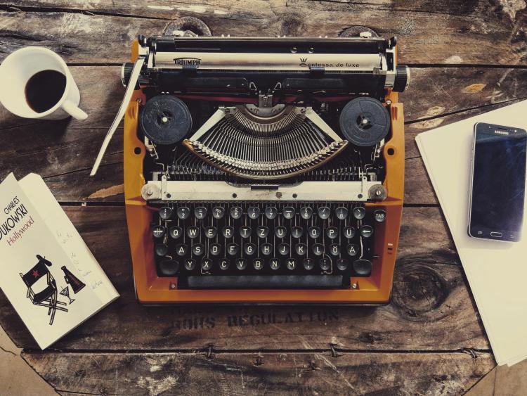 TYPEWRITER on wooden desk