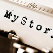 Close up of a page that says "My Story" loaded on a typewriter