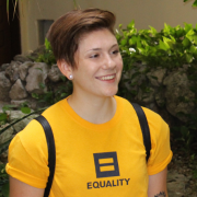 Person wearing a T-shirt that says, "equality"