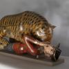 Tiger eating a man sculpture