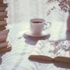 A CUP OF TEA ON A TABLE