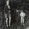 Photo of woman and child both wearing masks