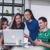 group meeting around a computer