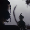 Amy Adams pointing at graphic from the film Arrival