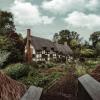 English home surrounded by foliage