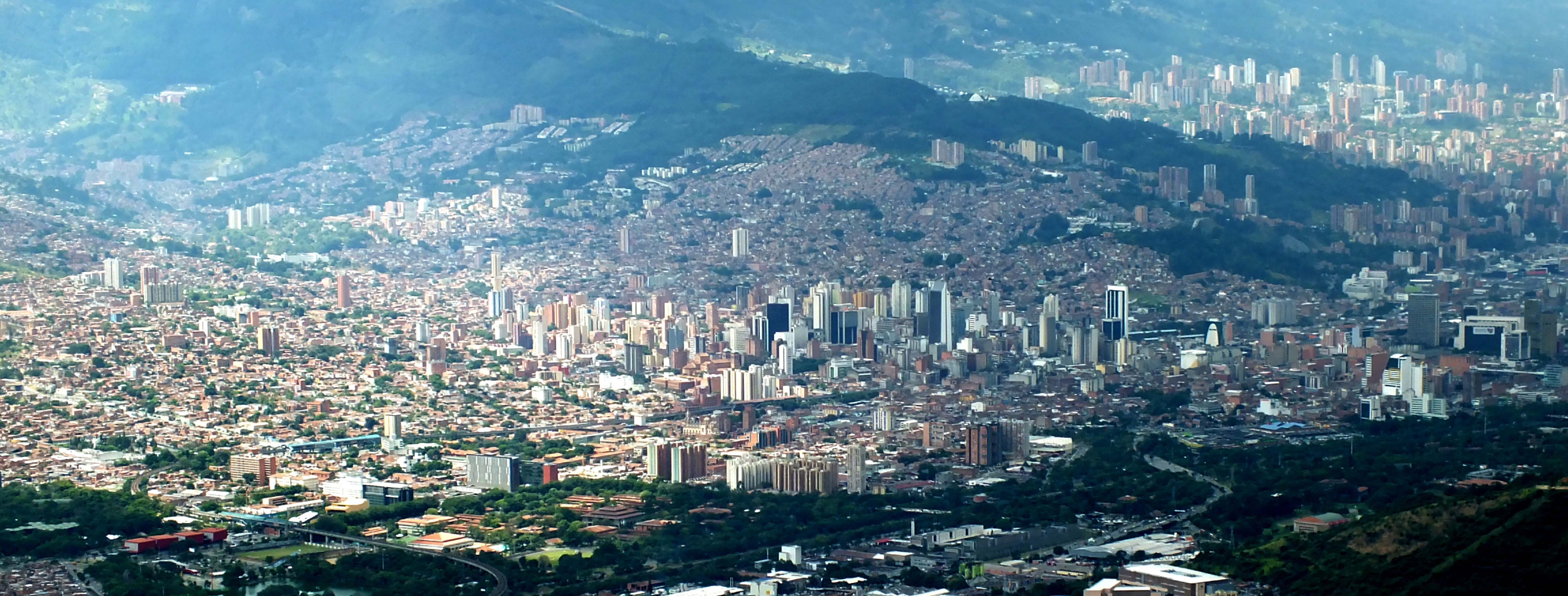 Medellin 2 - Centro historico y El Poblado (al fondo) by Omar Uran is licensed under CC BY 2.0