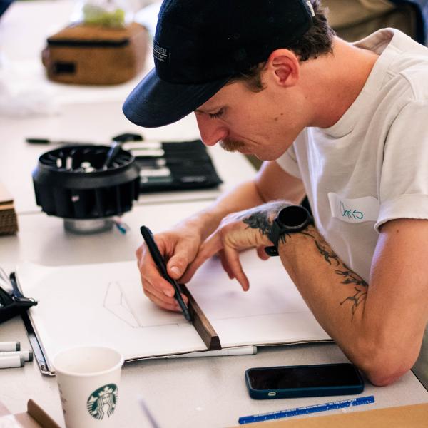 Student works on design