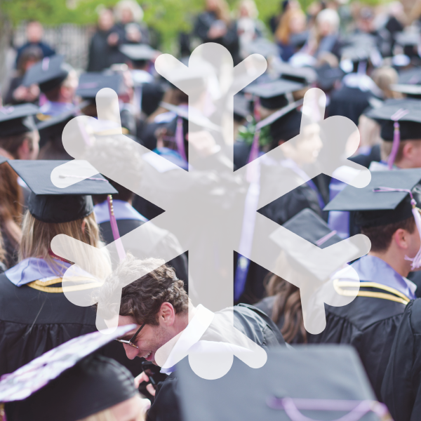 Snowflake graphic in front of a crowd of grads