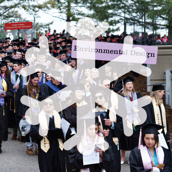 Snowflake symbol in front of a crowd of ENVD graduates
