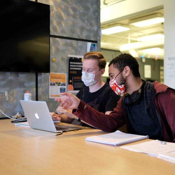 Students working together in the ENVD building