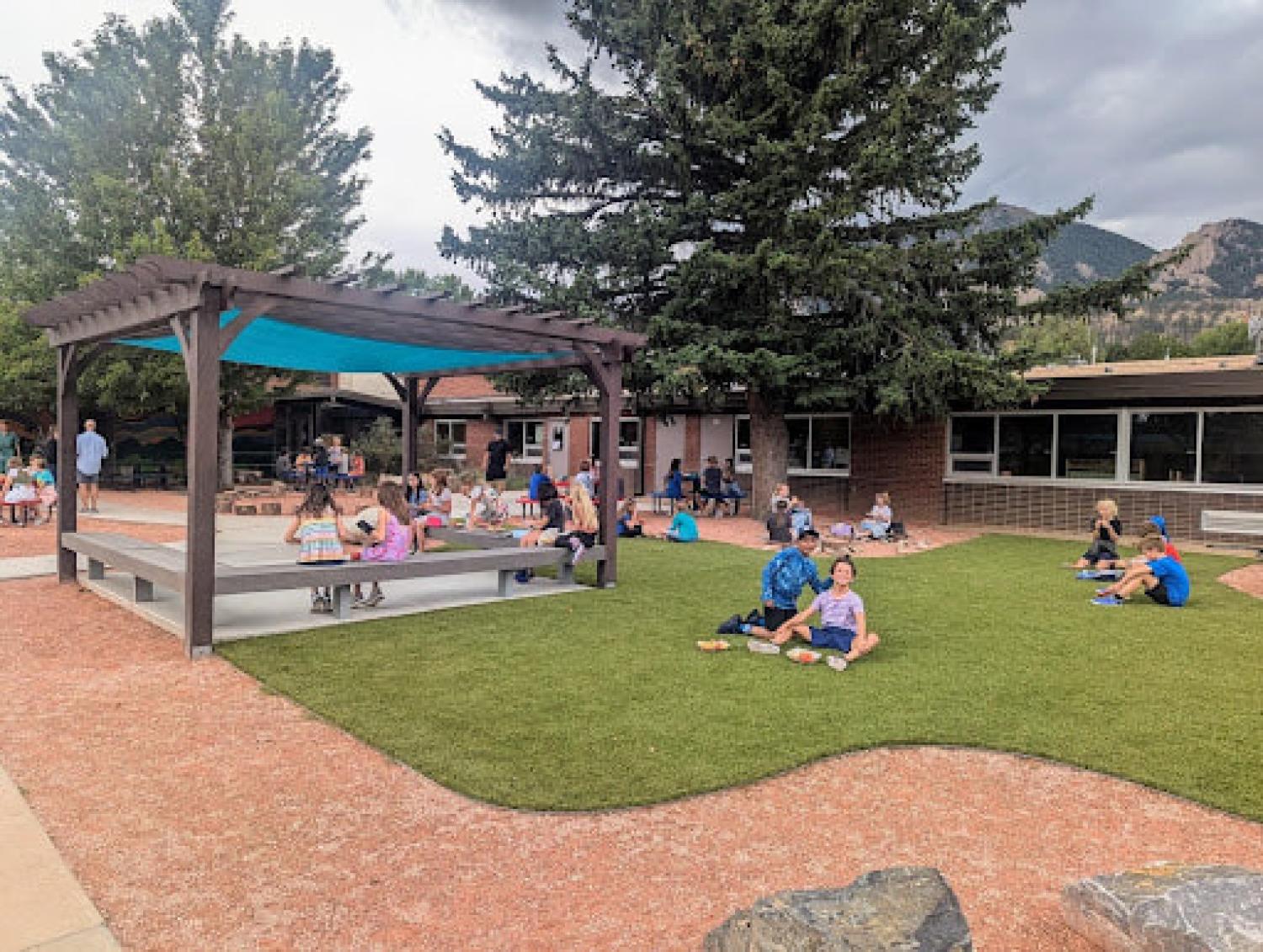 Elementary students play on Mesa Oasis with new turf