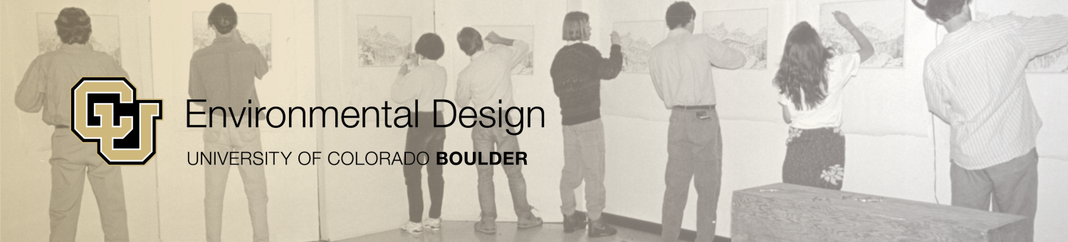 An archived photo of ENVD students pinning up their work
