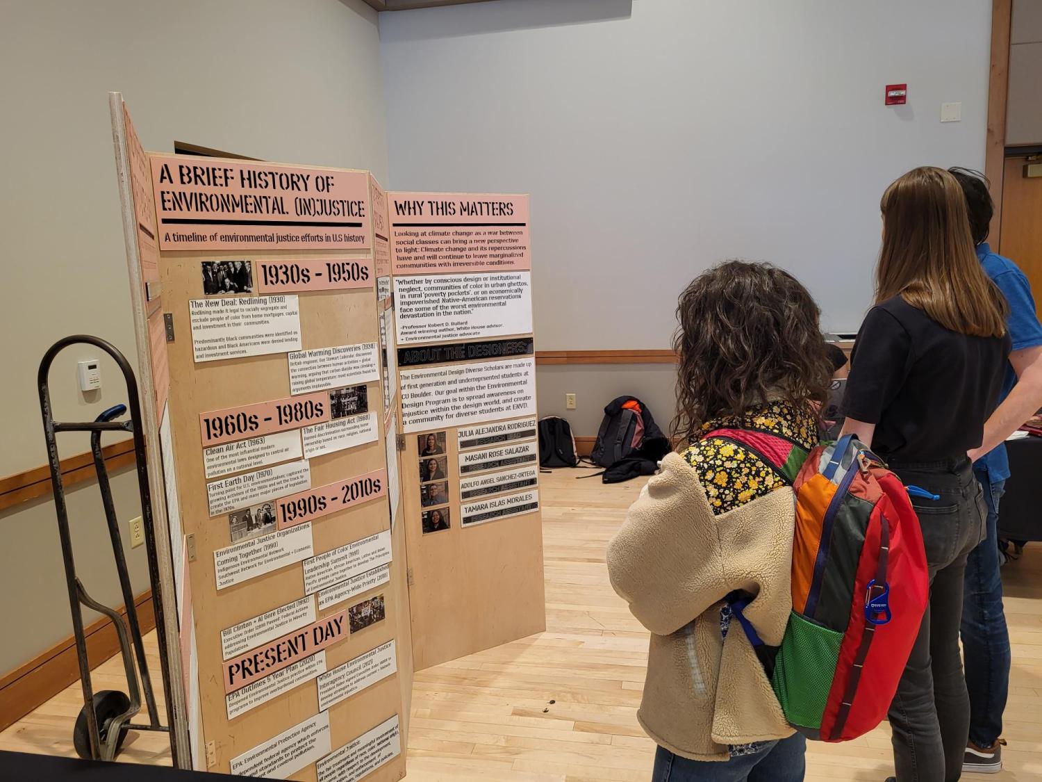Students viewing work on display at the CU Climate Expo