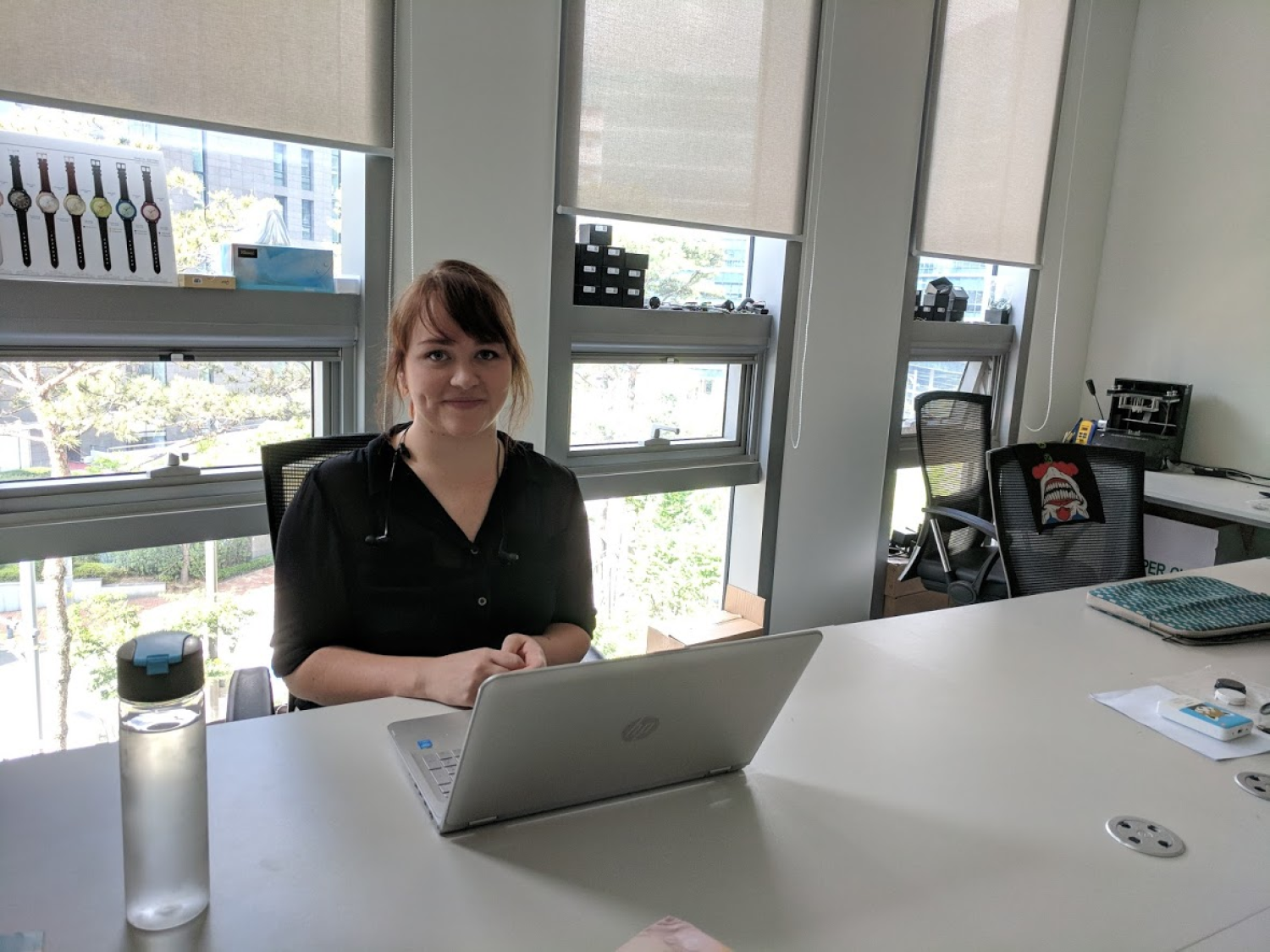 Kassie at her desk