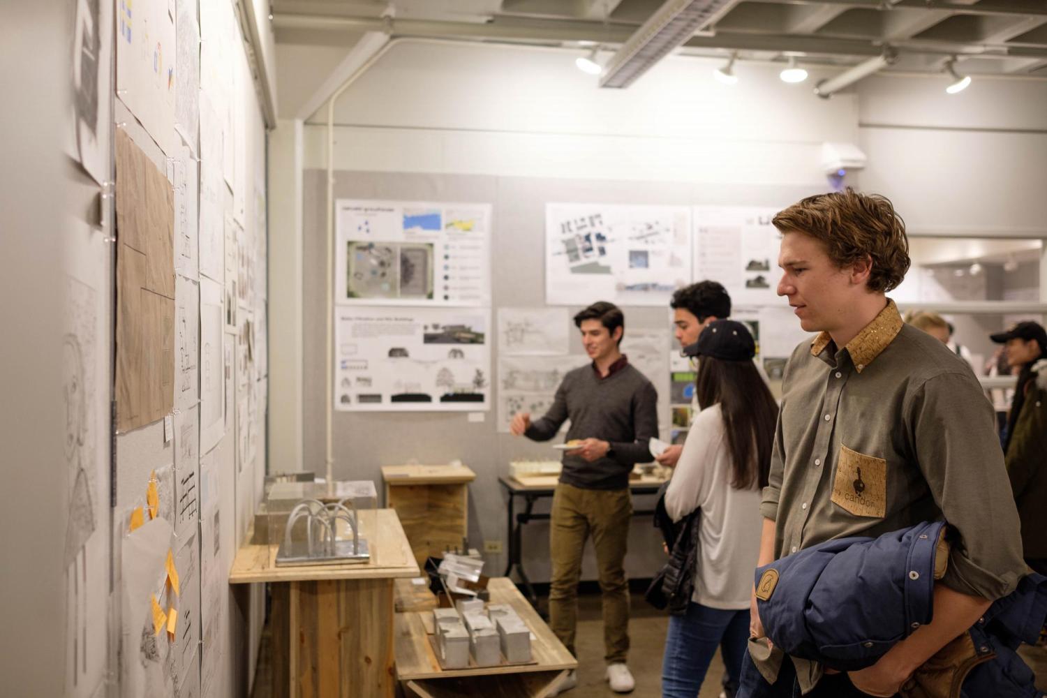 Student viewing projects at December 2018 open house
