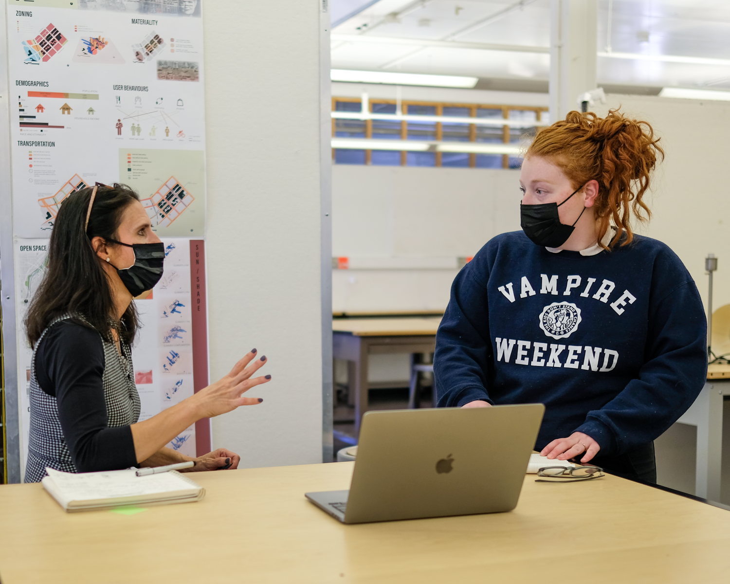 ENVD Instructor Jade Polizzi speaking to a student