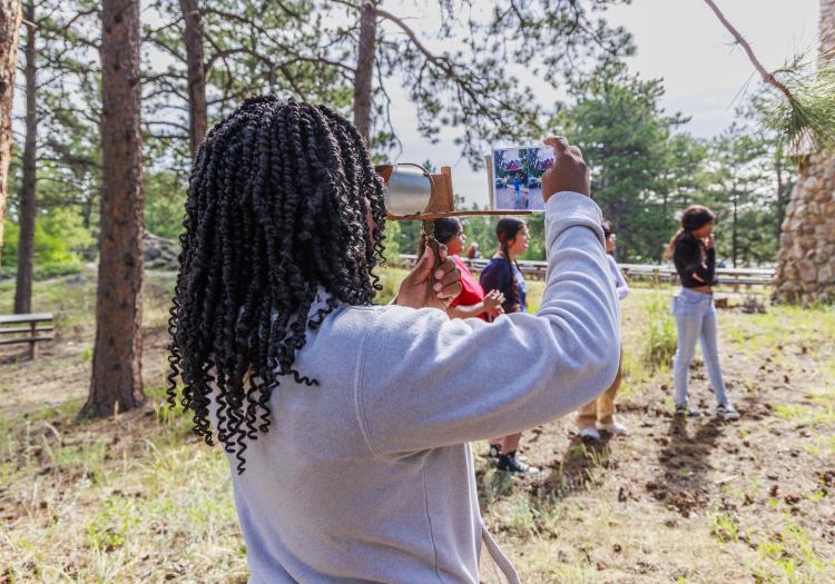 student conducting field research