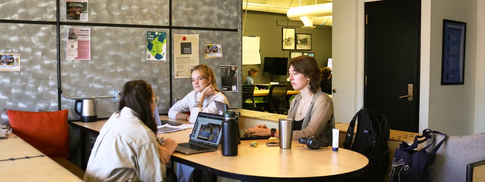 Students chat in third floor open space