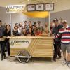 Senior Instructor Jade Polizzi's design-build class poses with final-built pasta cart.