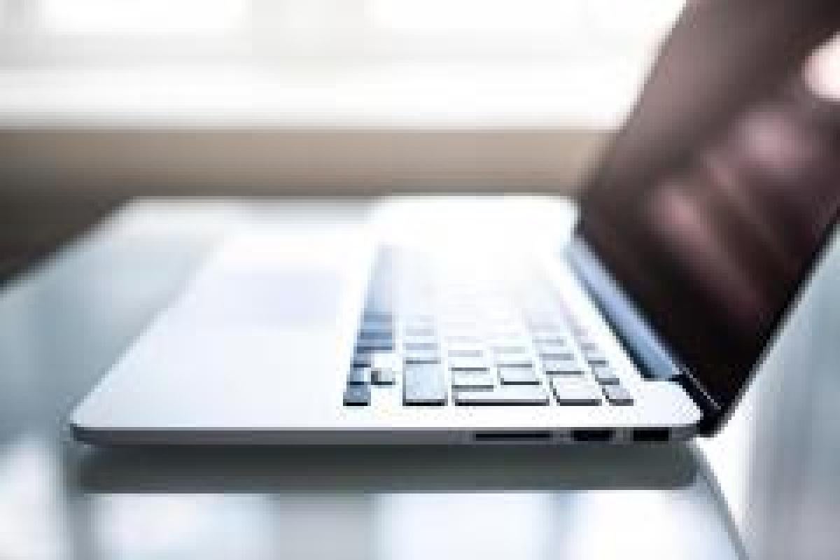Image of a laptop computer on a desk