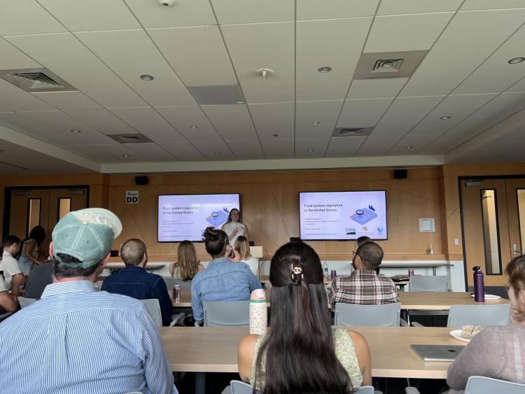 Margaret Hegwood presenting to a group during the ENVS Colloquium Series.